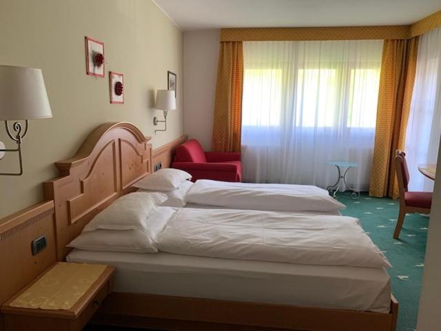 Postel nebo postele na pokoji v ubytování Hotel Mesdi