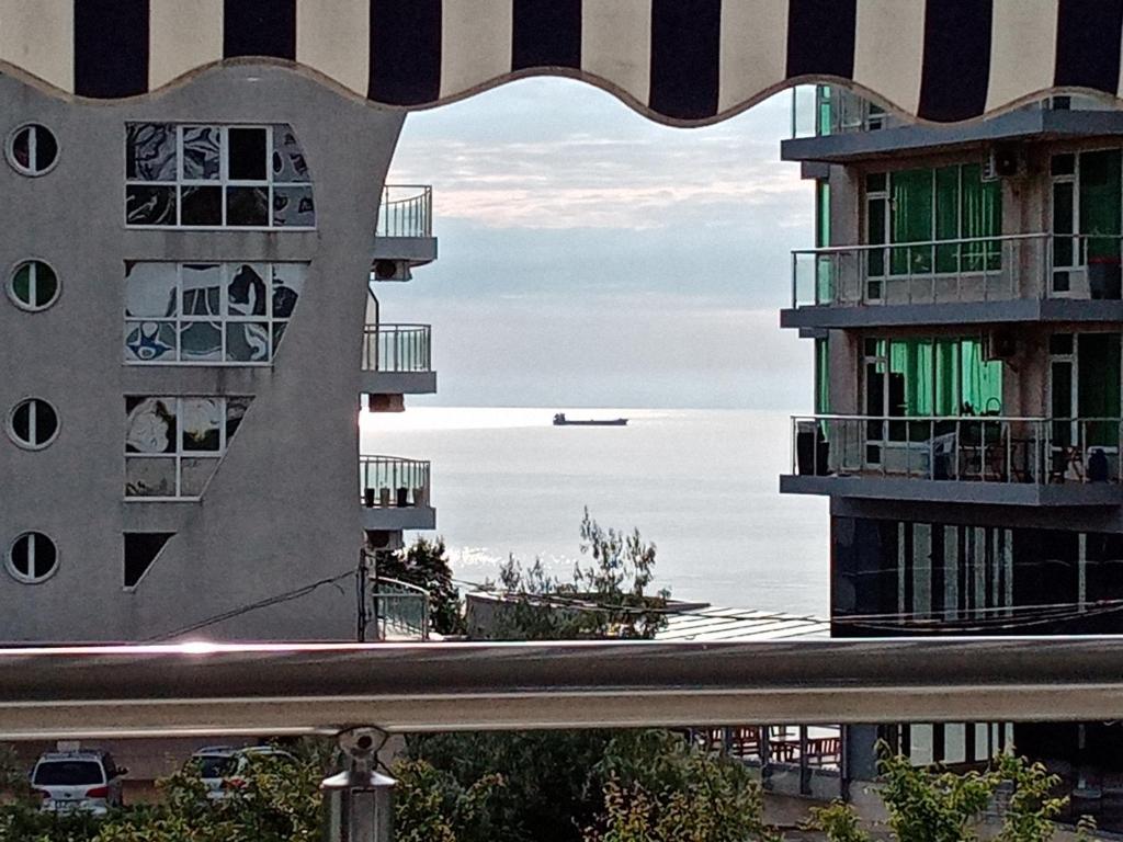 a view of the ocean from between two buildings at Victoria in Byala