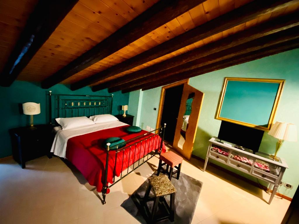 Postel nebo postele na pokoji v ubytování Bianca di Navarra House
