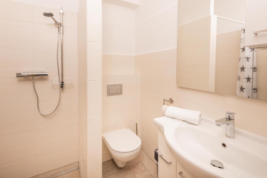 Koupelna v ubytování Mentenwirt Pension&Appartements