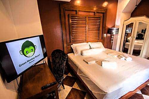 Postel nebo postele na pokoji v ubytování Green Monkey Resort Boracay
