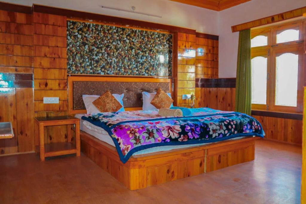Postel nebo postele na pokoji v ubytování Hotel Thachung