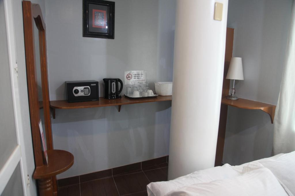 Postel nebo postele na pokoji v ubytování Green Monkey Resort Boracay
