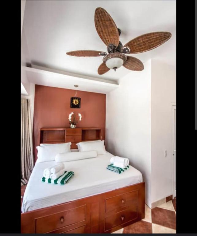 Postel nebo postele na pokoji v ubytování Green Monkey Resort Boracay