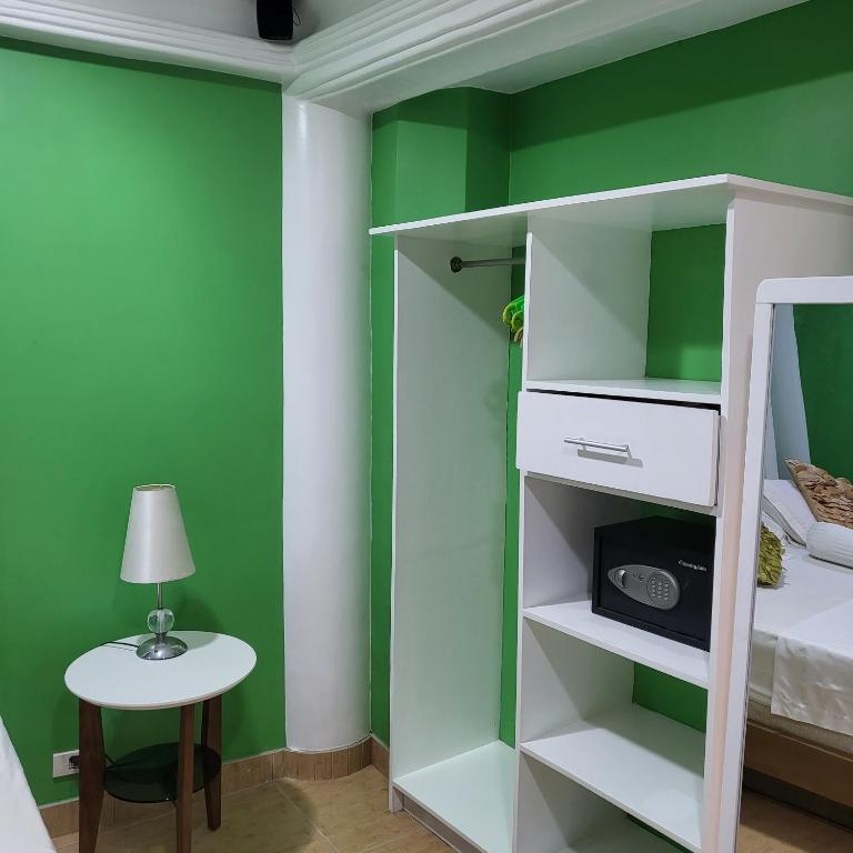 Postel nebo postele na pokoji v ubytování Green Monkey Resort Boracay