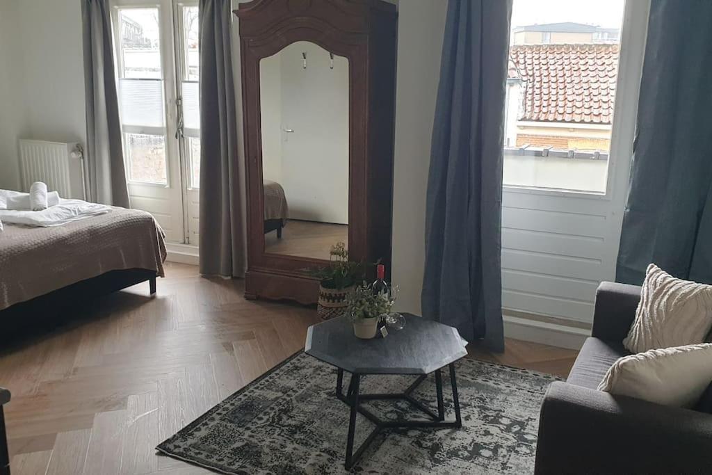 Postel nebo postele na pokoji v ubytování Apart Hotel De Grote Kade