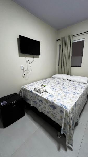 Postel nebo postele na pokoji v ubytování Pousada D’Uriel