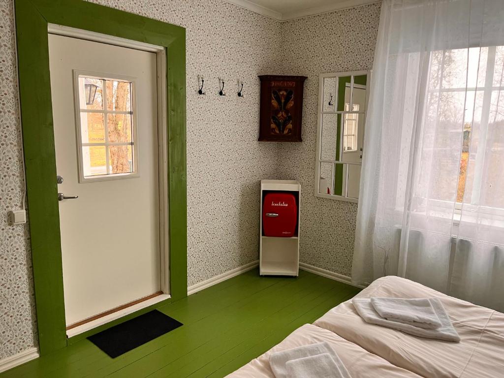 Postel nebo postele na pokoji v ubytování ÖlandsRo B&B