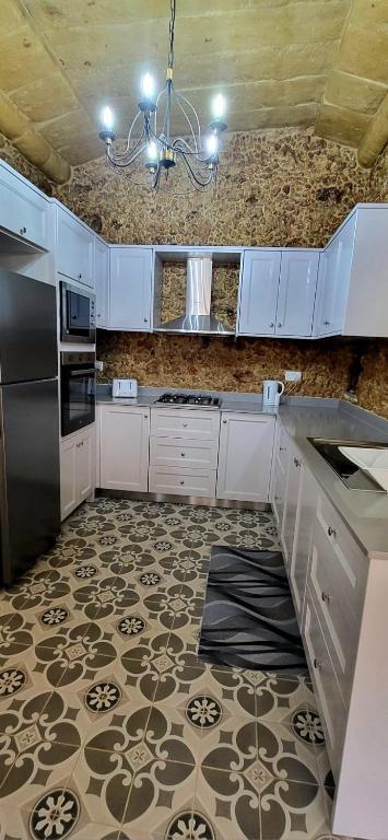 Kuchyň nebo kuchyňský kout v ubytování Tan-Napli Farmhouse