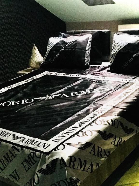 Posteľ alebo postele v izbe v ubytovaní Ádám Apartmanház