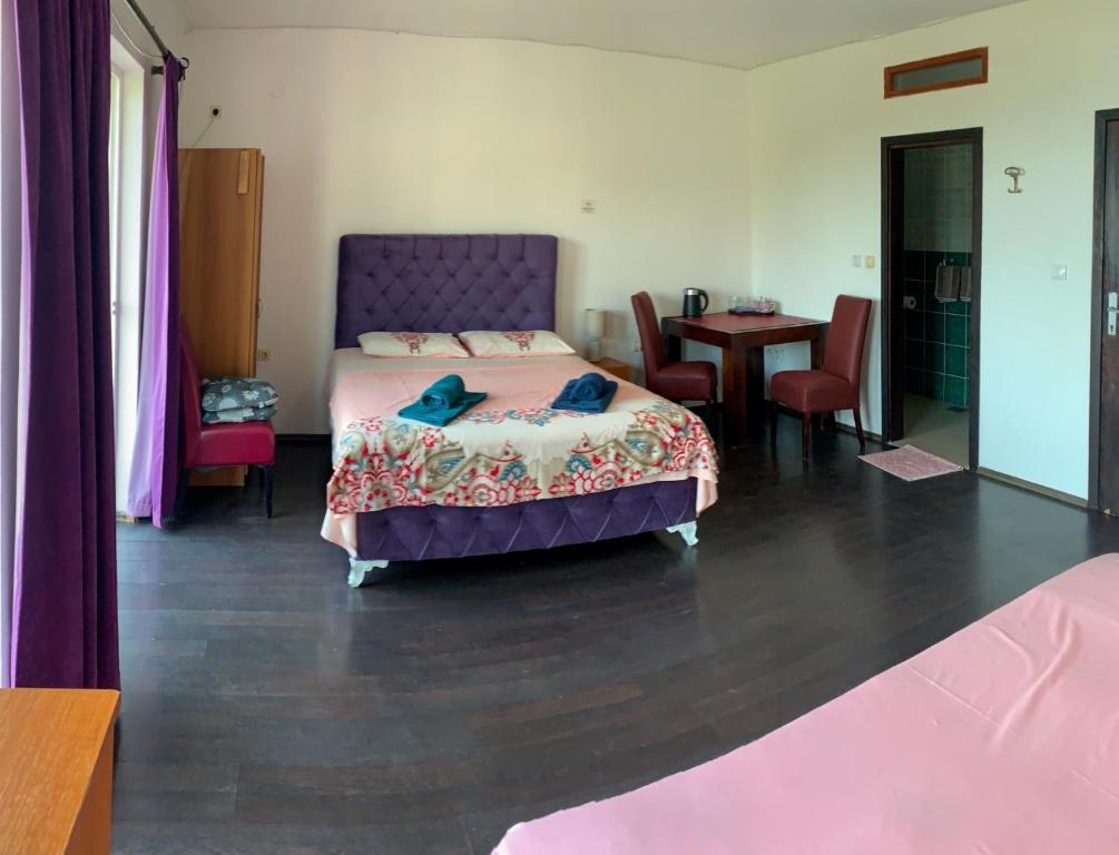 Postel nebo postele na pokoji v ubytování Villa Dulsinea