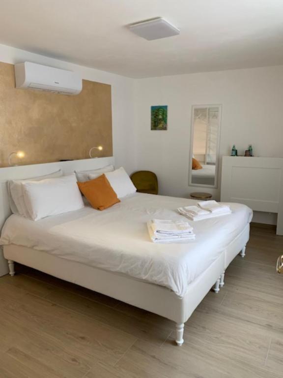 Postel nebo postele na pokoji v ubytování B&B San Francesco Class