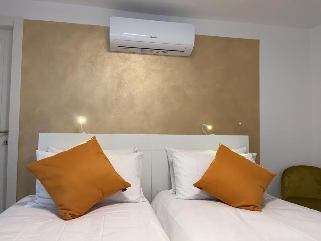 Postel nebo postele na pokoji v ubytování B&B San Francesco Class