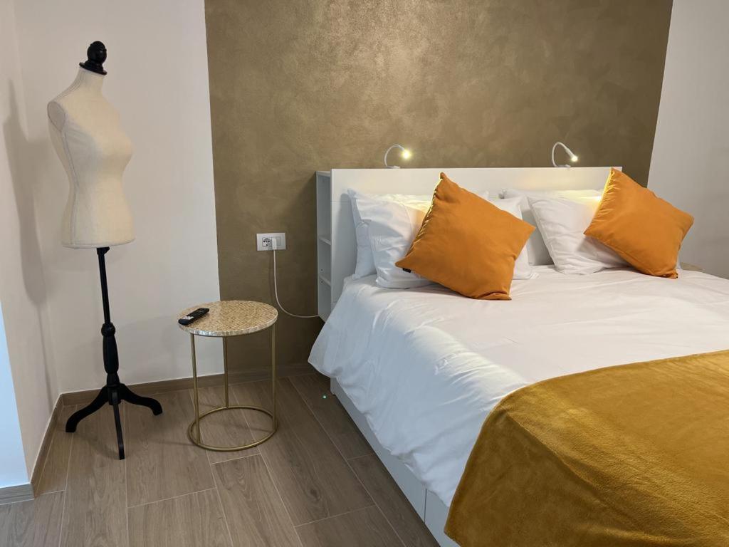 Postel nebo postele na pokoji v ubytování B&B San Francesco Class