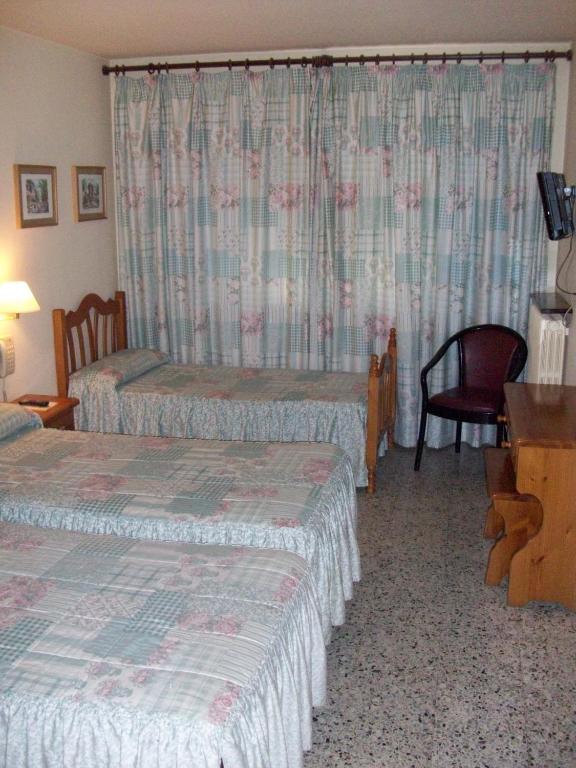 Postel nebo postele na pokoji v ubytování Hotel Delavall