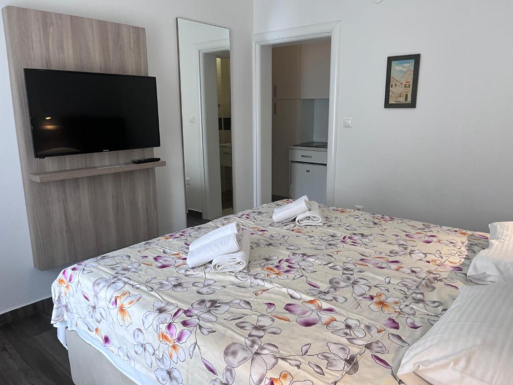 Voodi või voodid majutusasutuse Rooms & Apartment Mama Mia toas