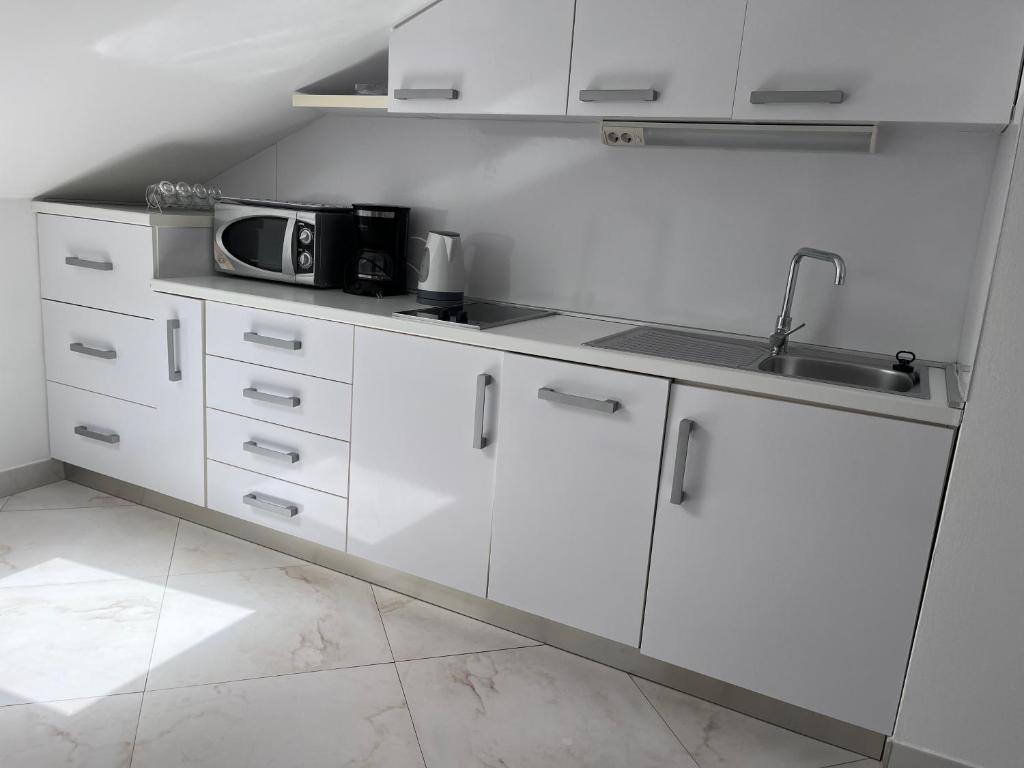 Köök või kööginurk majutusasutuses Rooms & Apartment Mama Mia