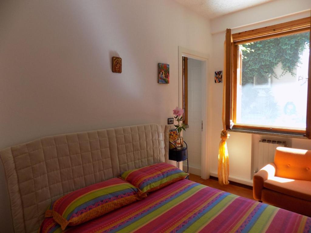 Postel nebo postele na pokoji v ubytování B&B La Gatta Blu