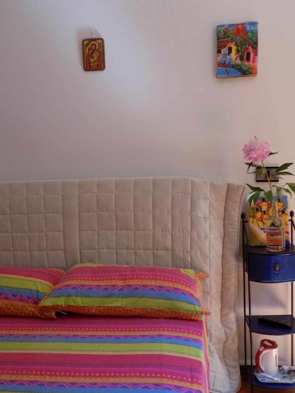Postel nebo postele na pokoji v ubytování B&B La Gatta Blu
