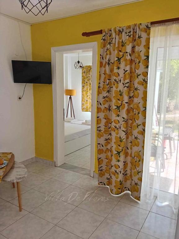 TV a/nebo společenská místnost v ubytování Villa De Flores