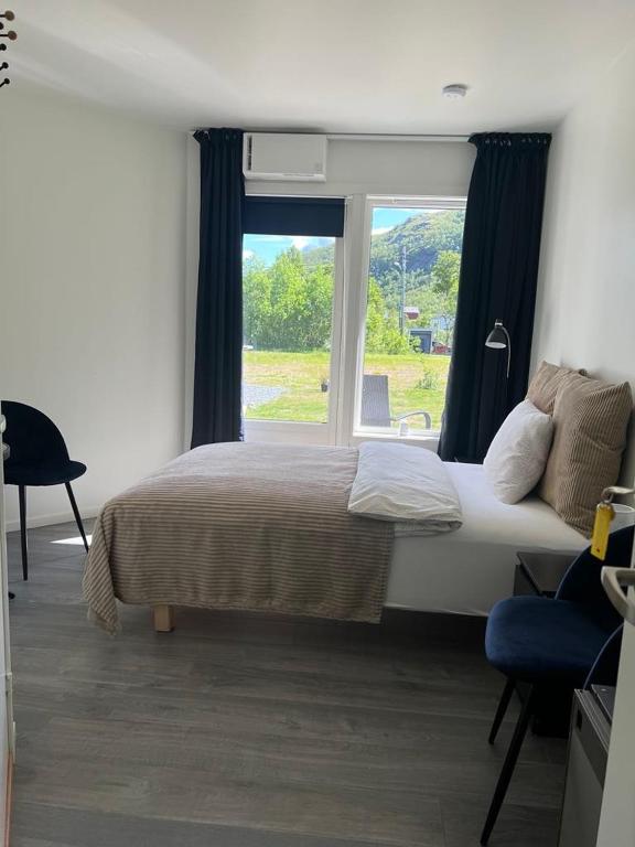 Postel nebo postele na pokoji v ubytování Senja Living