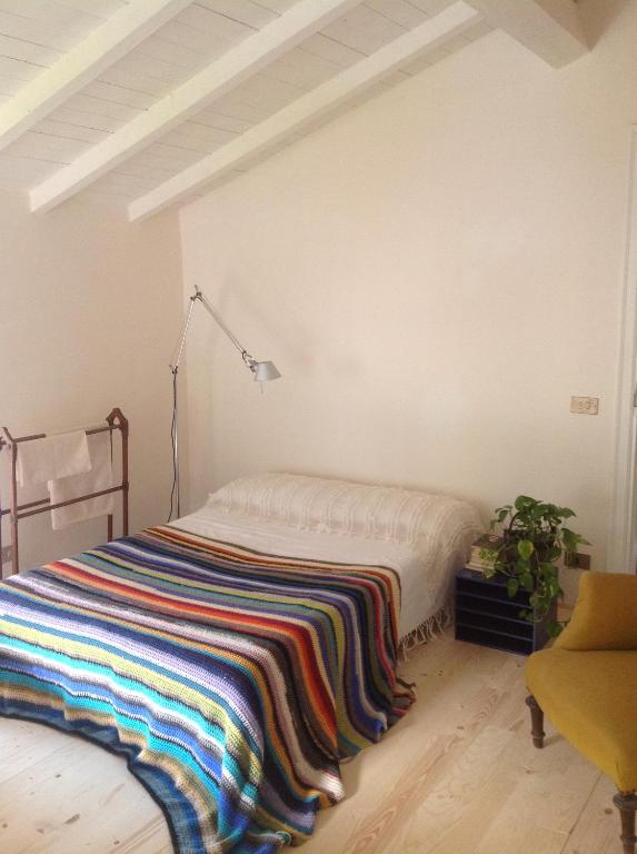 Postel nebo postele na pokoji v ubytování Villa Giovanna