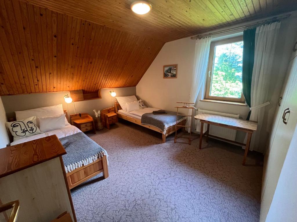 Postel nebo postele na pokoji v ubytování Andikó Vendégház