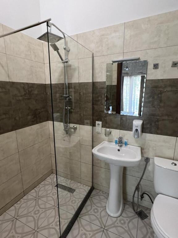 Koupelna v ubytování Magic Hotel