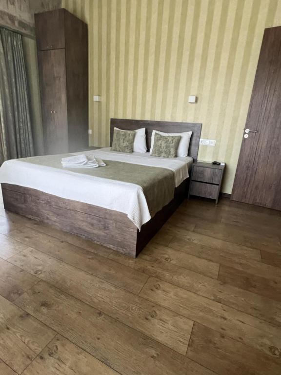 Postel nebo postele na pokoji v ubytování Magic Hotel