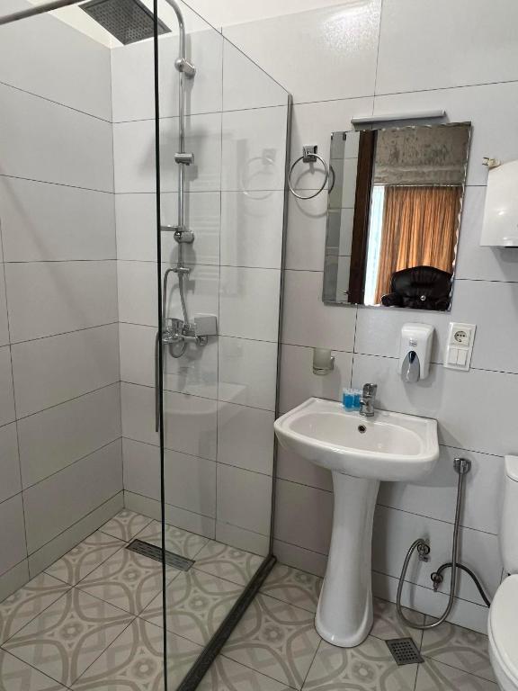 Koupelna v ubytování Magic Hotel