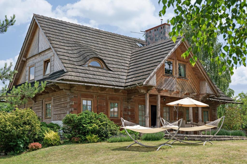 Κήπος έξω από το Dom Nad Jeziorem Mazury Kamień
