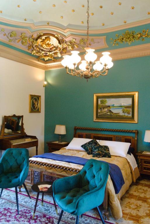 Postel nebo postele na pokoji v ubytování Allure Palace