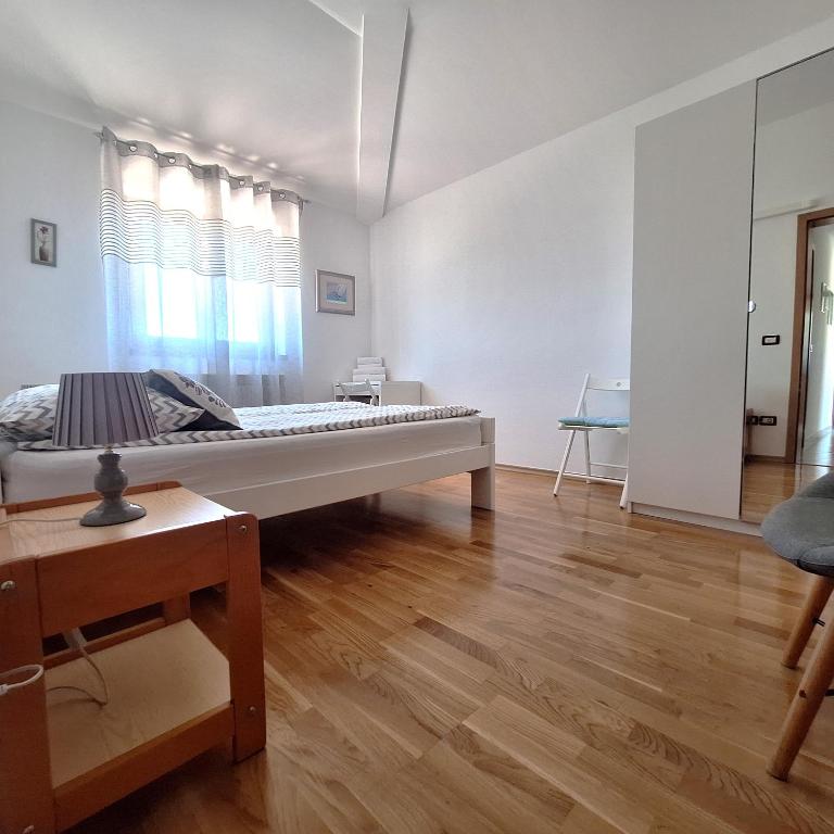 Posteľ alebo postele v izbe v ubytovaní Apartment Mita