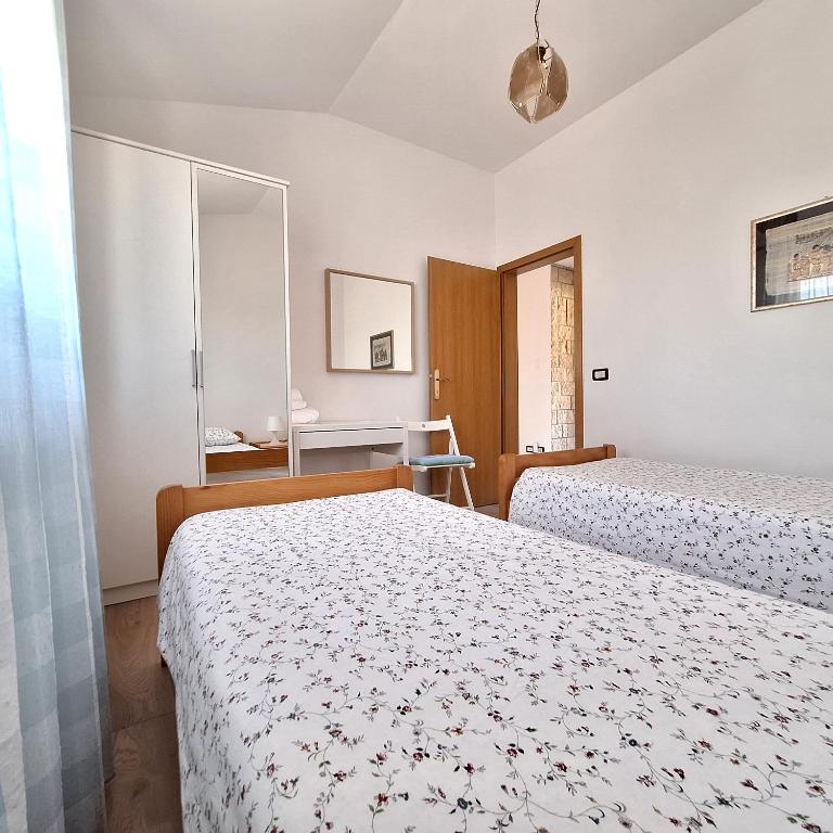 Posteľ alebo postele v izbe v ubytovaní Apartment Mita