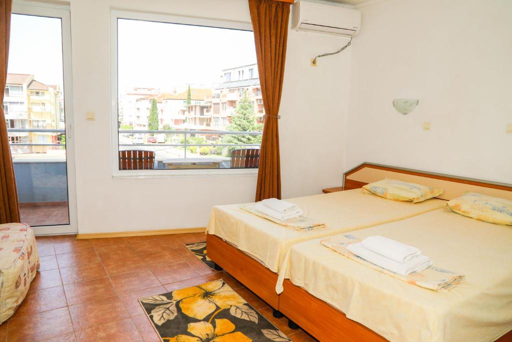 Postel nebo postele na pokoji v ubytování Hotel Sofia Beach