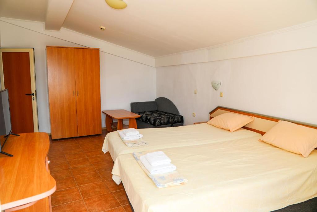 Postel nebo postele na pokoji v ubytování Hotel Sofia Beach