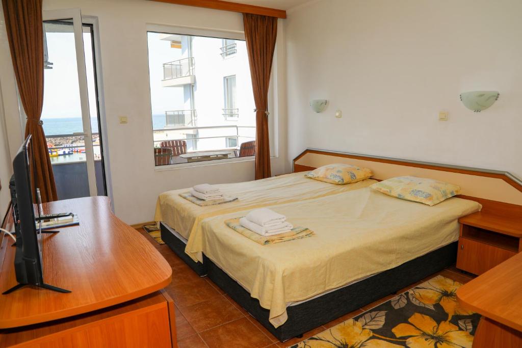 Postel nebo postele na pokoji v ubytování Hotel Sofia Beach