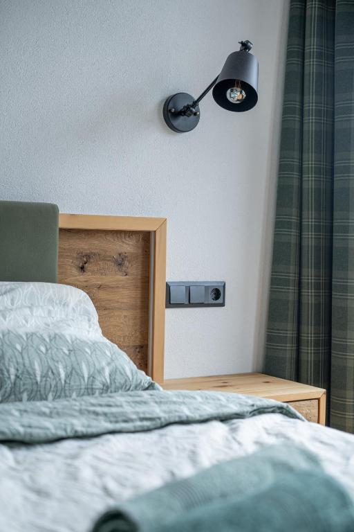 Postel nebo postele na pokoji v ubytování Rennerhof - Ferienwohnung im Lesachtal