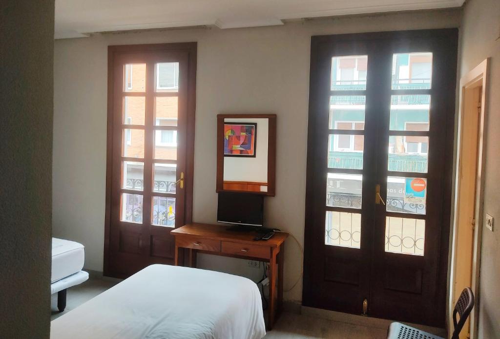 Postel nebo postele na pokoji v ubytování Hotel Lauxeta Berria