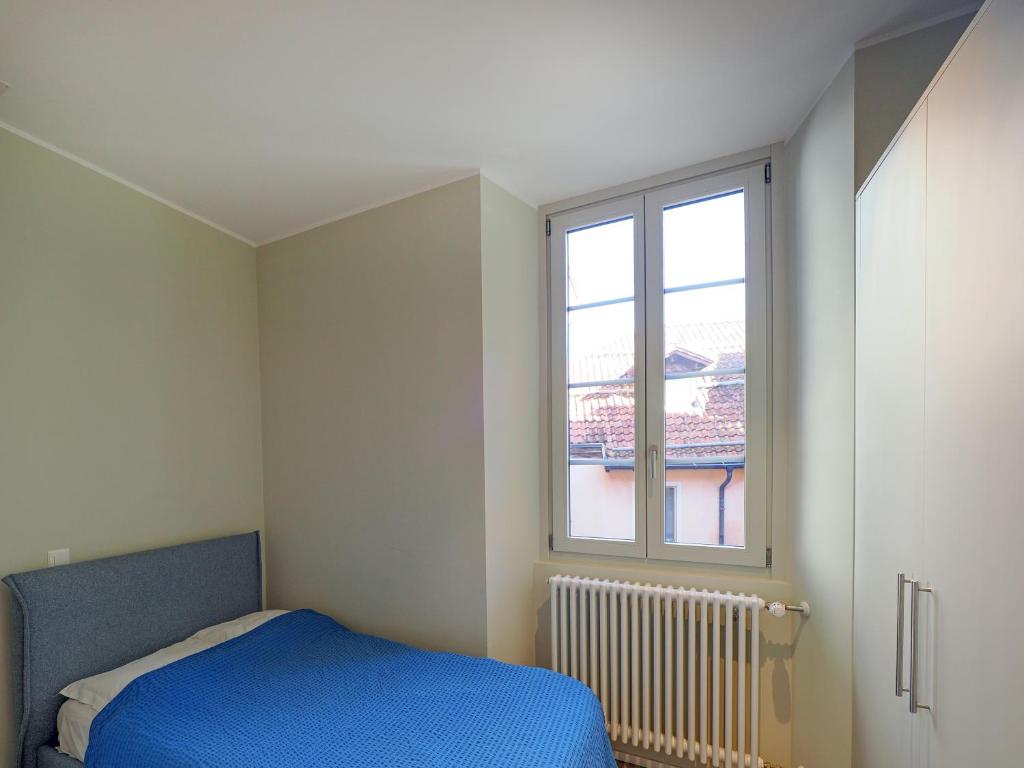 Postel nebo postele na pokoji v ubytování Appartamento Carnival 9