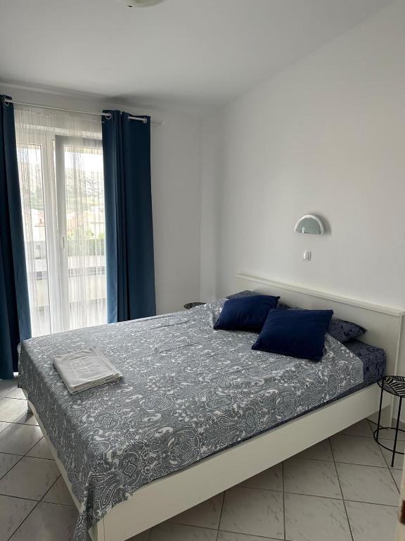 Posteľ alebo postele v izbe v ubytovaní Apartments A&S