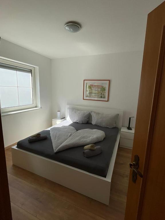 Postel nebo postele na pokoji v ubytování Hotel Mörbischerhof