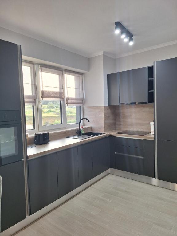 Køkken eller tekøkken på City Luxury Apartment