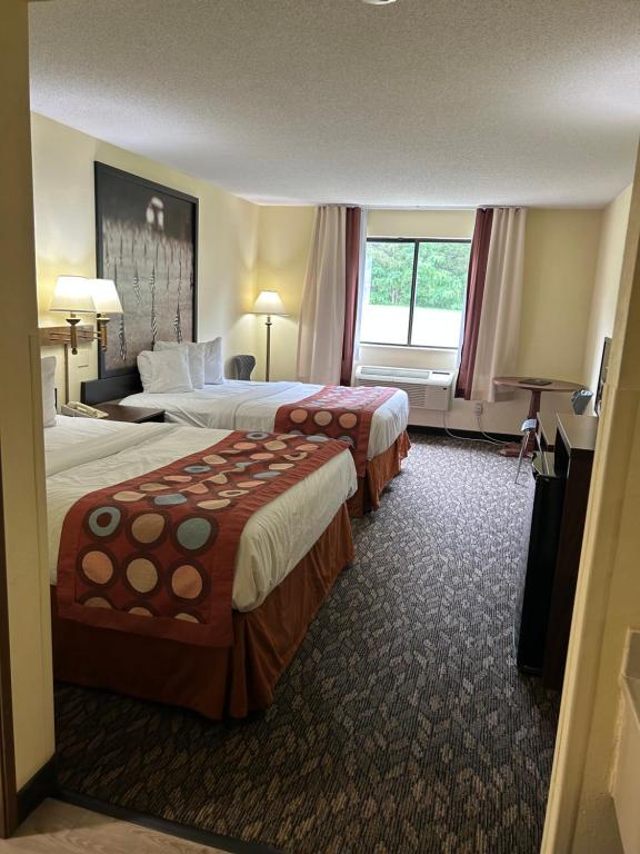 Postel nebo postele na pokoji v ubytování Super 8 by Wyndham Gettysburg