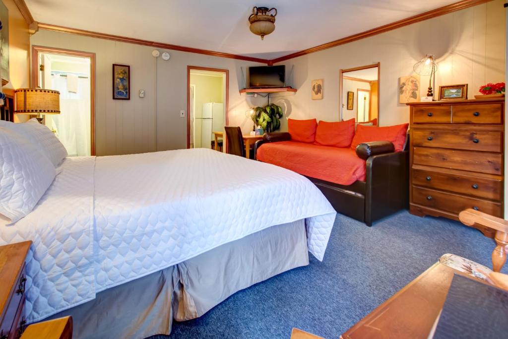 Postel nebo postele na pokoji v ubytování Starlite Motel & Suites