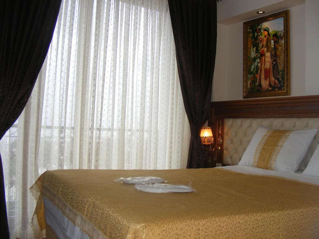 Postel nebo postele na pokoji v ubytování Blue Istanbul Hotel