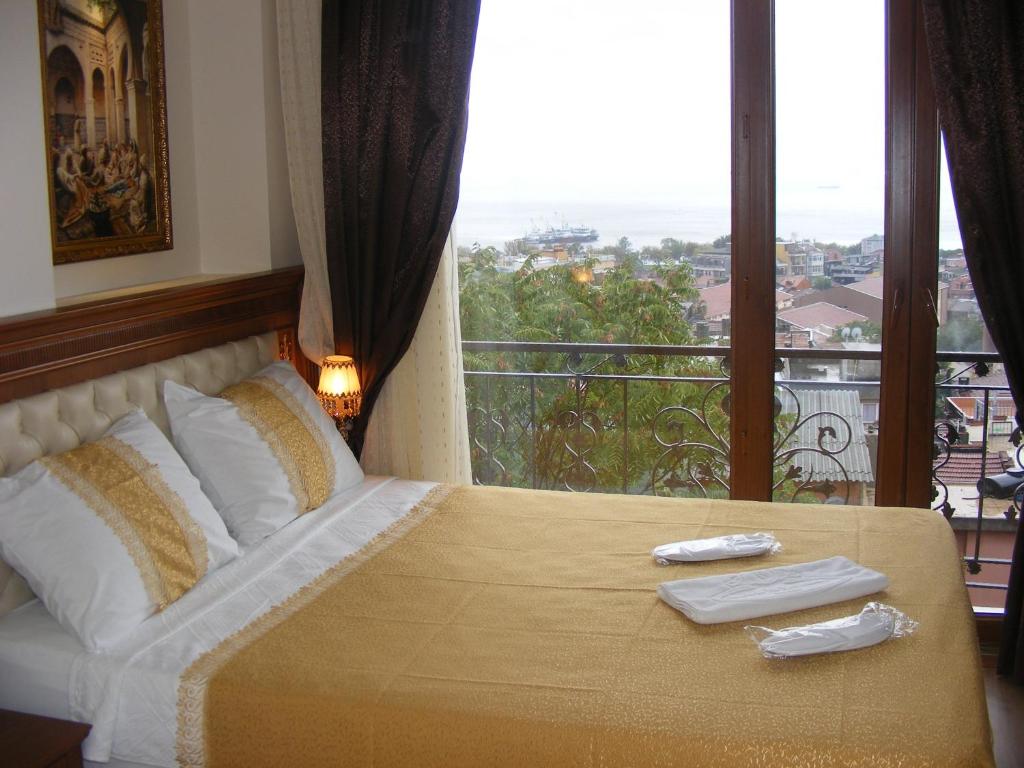Postel nebo postele na pokoji v ubytování Blue Istanbul Hotel