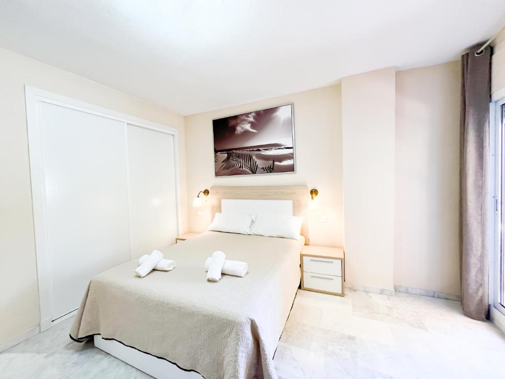 Posteľ alebo postele v izbe v ubytovaní Apartamento la Reserva de Marbella