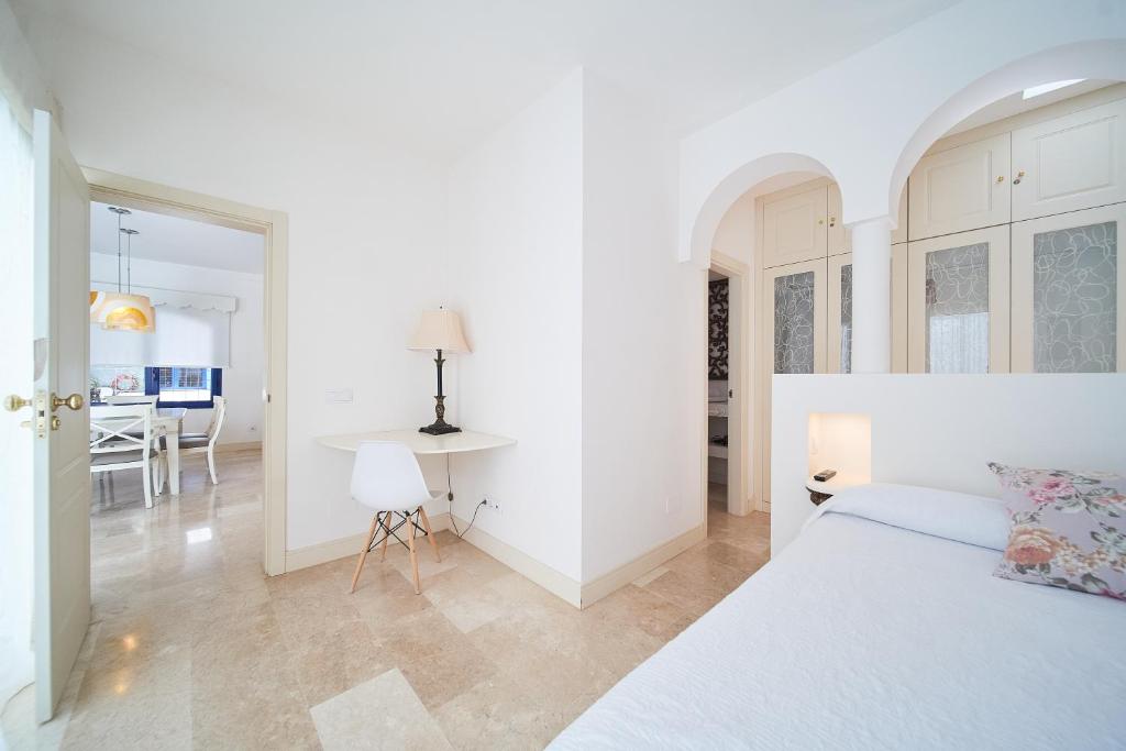 Posteľ alebo postele v izbe v ubytovaní KATIS Villas Boutique in Bahiazul