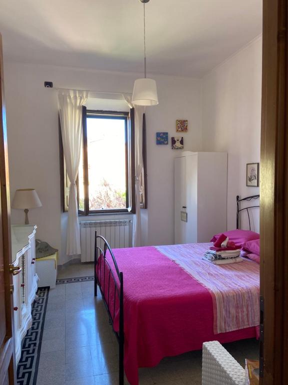 Postel nebo postele na pokoji v ubytování Tuscany Location